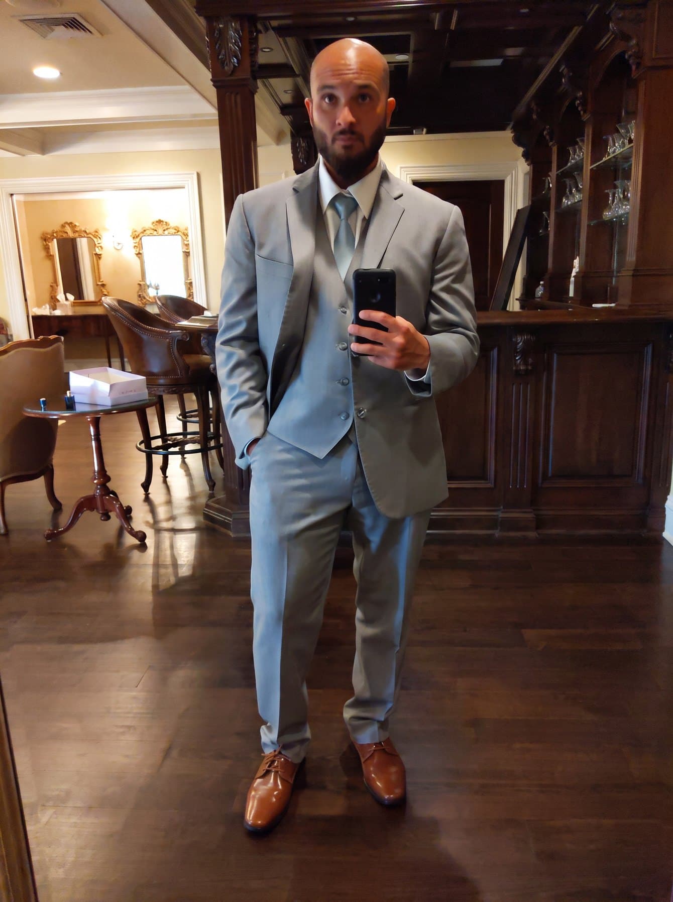 Neb (NebMeta / @CLOUD_STR1FE) in a three-piece light gray suit